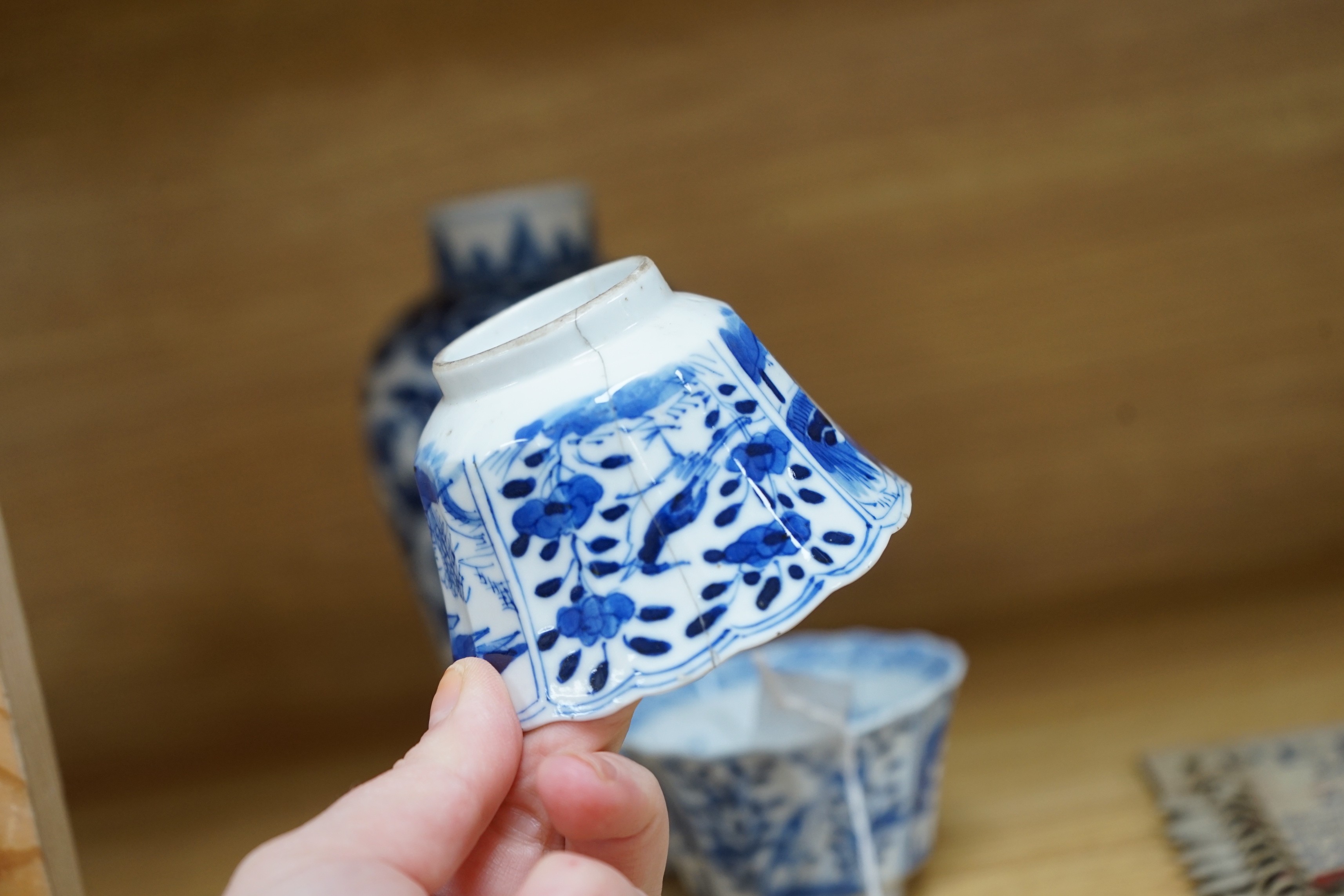 A Chinese blue and white phoenix decorated vase, a pair of circular boxes and a pair of damaged tea bowls. Late 19th century Tallest 17.5cm